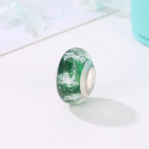 Green glass snowflake charm bead with silver core for DIY winter Christmas bracelets