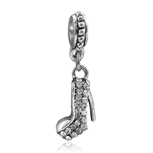 Detailed view of silver stiletto charm with white crystal inlay and sparkling zirconias