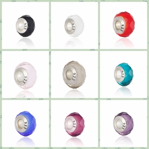 Macro view of multi-color faceted crystal beads with S925 silver cores for DIY bracelets