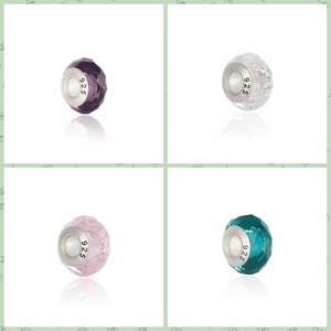 Macro detail of faceted crystal glass beads with 925 silver core for DIY jewelry