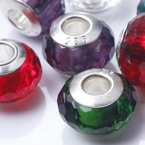 Macro shot of faceted crystal beads with S925 sterling silver core in various colors
