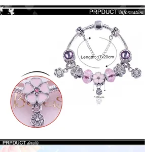 Close-up detail of pink crystal beads and flower charms with 17-20cm length dimension
