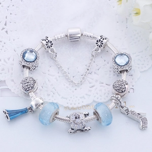 Bracelet à breloques perles de style ethnique avec verre bleu et carrosse citrouille