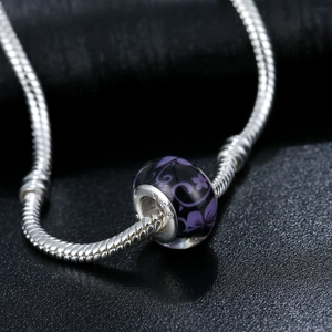 Ethnic purple resin bead bracelet with flower pattern on silver snake chain
