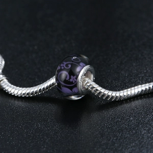 Ethnic DIY charm bracelet with purple floral resin bead and silver snake chain