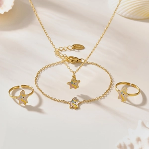 Kids stainless steel jewelry set featuring colorful unicorn stars in gold finish