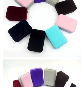 Detailed view of luxury velvet jewelry boxes in diverse colors with soft round corners