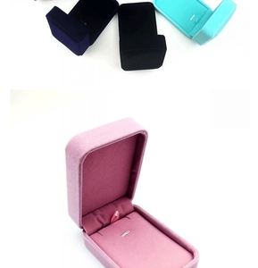 Detailed view of multi-color velvet jewelry boxes for necklaces and pendants