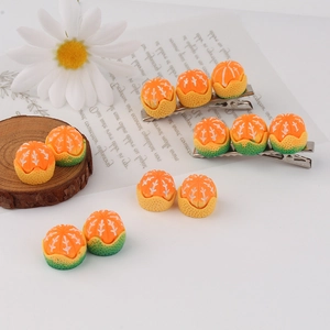 Realistic orange resin charms and clips for DIY hair accessories and crafts