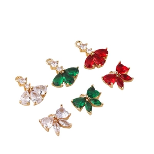 Colgantes de lazo y flor en latón dorado con circonitas de colores para joyería