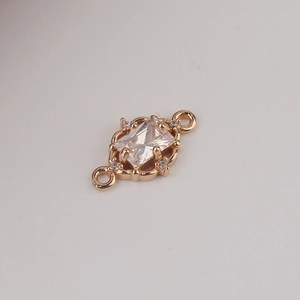 Macro view of gold-plated rectangular zircon connector for DIY bracelet jewelry making