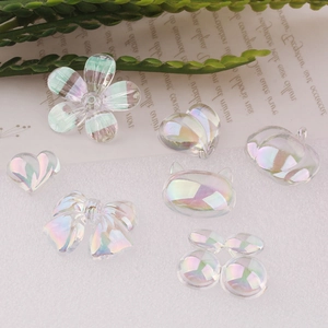 DIY colorful resin charms set including heart and flower shapes with iridescent finish