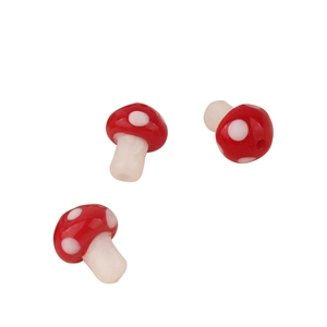 Three handmade red mushroom glass beads for DIY jewelry making and necklace crafts