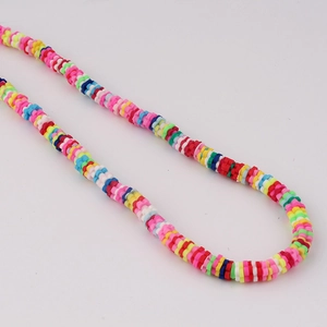 Detail of colorful polymer clay flower beads for DIY jewelry and beaded phone chains