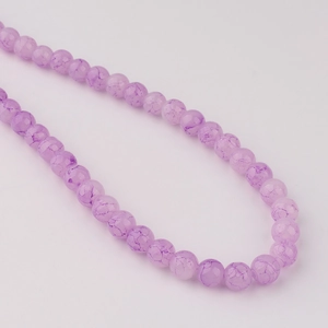 Vue détaillée de perles rondes en verre craquelé violet 8mm pour bijoux DIY créations