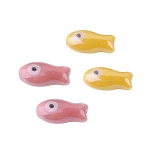 Handmade fish-shaped ceramic beads in yellow and pink for DIY jewelry making