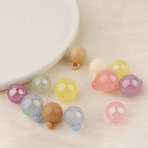 Colorful resin beads with hanging loops for DIY jewelry making in assorted candy tones