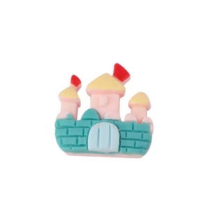 Colorful resin castle charm for DIY crafts and hair clips with pink walls and yellow spires