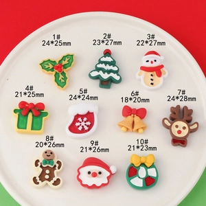 Set of 10 festive Christmas resin charms including Santa, elk, and trees for DIY crafts