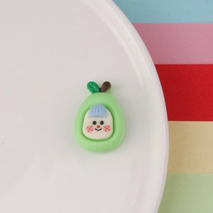 Detailed view of cute resin avocado charm for DIY craft phone case and hair accessories