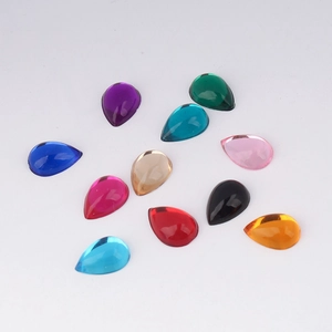 Polished acrylic drop cabochons in various vibrant colors for DIY jewelry and hair accessories