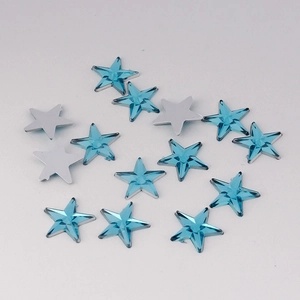 Macro detail of 10mm blue faceted star rhinestones for DIY crafts and sewing