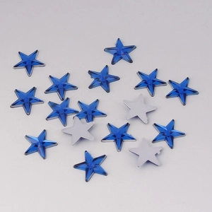 Detail of 10mm royal blue star rhinestones showing faceted cut and silver flat back