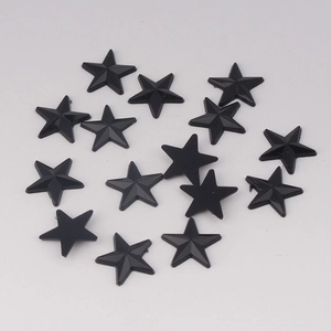 Close-up of black acrylic star-shaped rhinestones for DIY clothing accessories