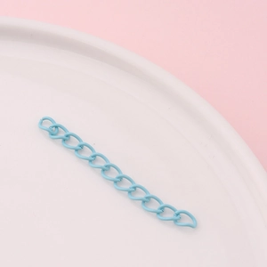 Detail of sky blue matte painted metal extension chain for DIY jewelry making and crafts
