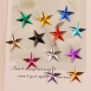 Macro detail of colorful pentagram star acrylic rhinestones for DIY handmade jewelry crafts