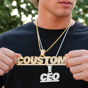 Detail of hip hop necklaces with iced-out custom gold and silver letter pendants