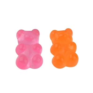 Colorful jelly resin gummy bear charms in pink and orange for DIY jewelry making