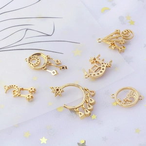 Golden celestial jewelry charms with moon and star shapes for DIY necklace earrings