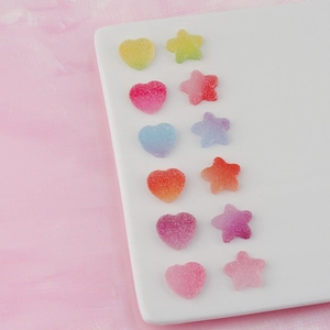 Detailed macro view of 12 gradient macaron sugar-coated resin heart and star charms