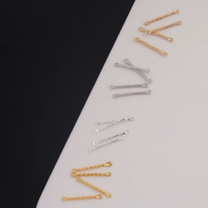 Detail of multi-color metal jewelry connectors with hammered texture for DIY making