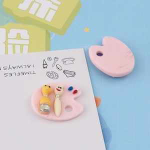 Detailed view of DIY resin palette charms for phone cases and handmade accessories