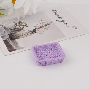 Macro detail of a lavender miniature resin woven basket for DIY crafts and decor