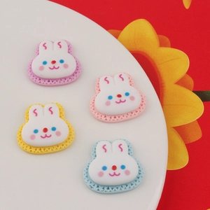 Set of four cute resin cartoon bunny biscuit charms in pastel colors for DIY crafts