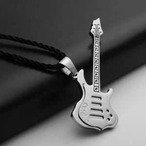 Macro shot of silver guitar pendant with realistic fretwork and black twisted cord
