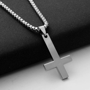 Polished silver stainless steel inverted cross pendant on a classic box chain