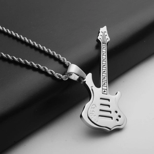 Close-up of silver stainless steel electric guitar pendant on twisted rope chain