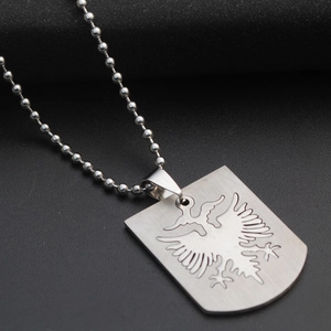 Brushed stainless steel shield pendant necklace featuring an Albanian double-headed eagle