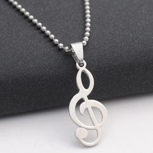 Polished stainless steel treble clef musical note pendant with matching bead chain necklace