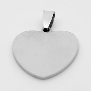 Detail view of heart-shaped stainless steel pendant with silver brushed metal finish