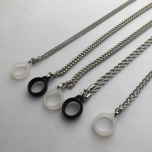 Detailed view of silver stainless steel chains with black and white silicone anti-lost rings