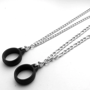 Detail of Figaro style stainless steel anti-lost lanyard with black silicone rings