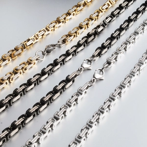Men's Byzantine style titanium steel king chain bracelet in silver and gold tone finishes