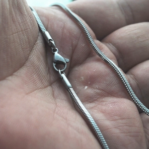 Sleek silver stainless steel square snake chain necklace with secure lobster clasp