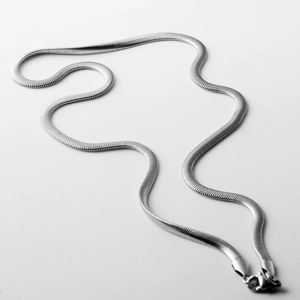 Close-up of silver snake chain necklace with lobster clasp on a white background