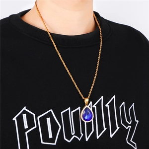 Hip hop style gold rope chain necklace featuring a deep blue water drop sapphire pendant